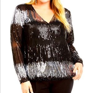 Elegant black and silver sequined blouse